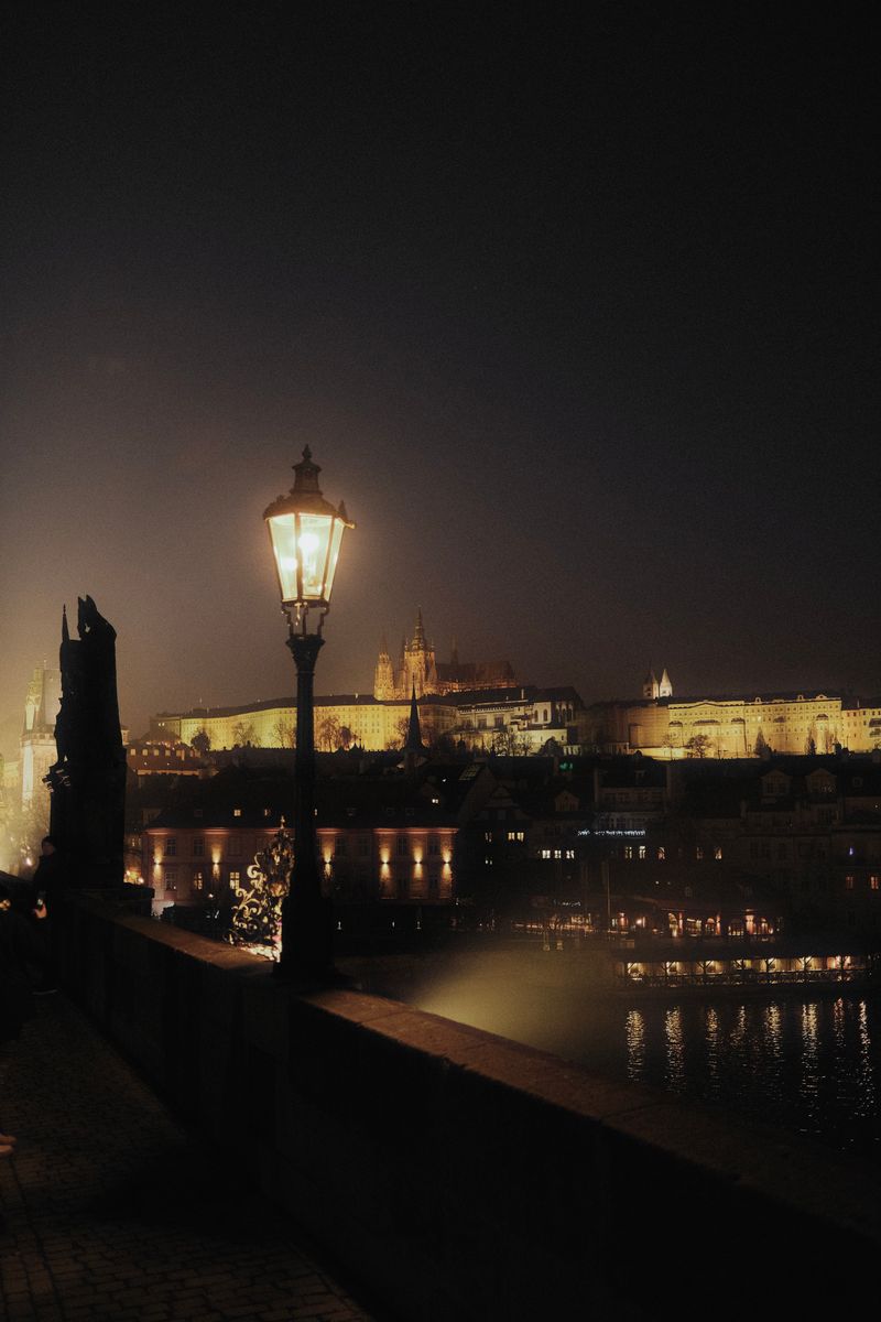 Street lamp and Prague Castle at night