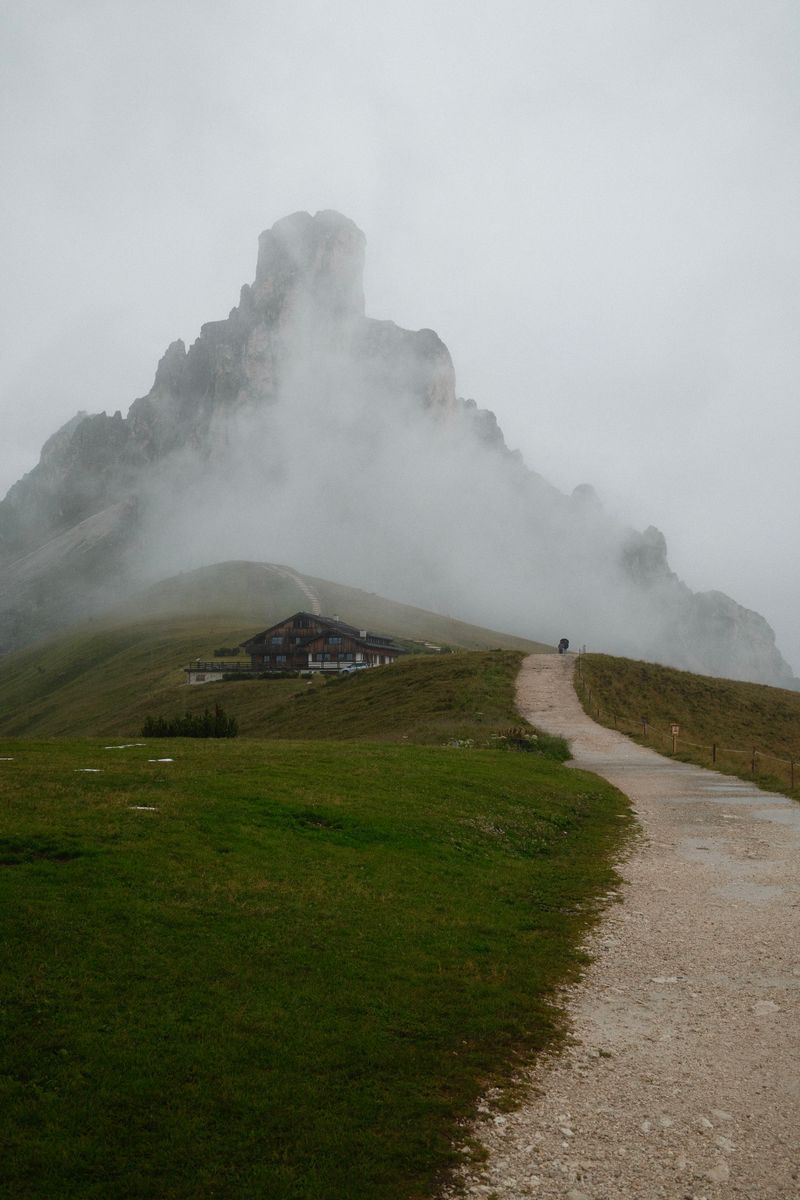 Path to a mountain hut in mist